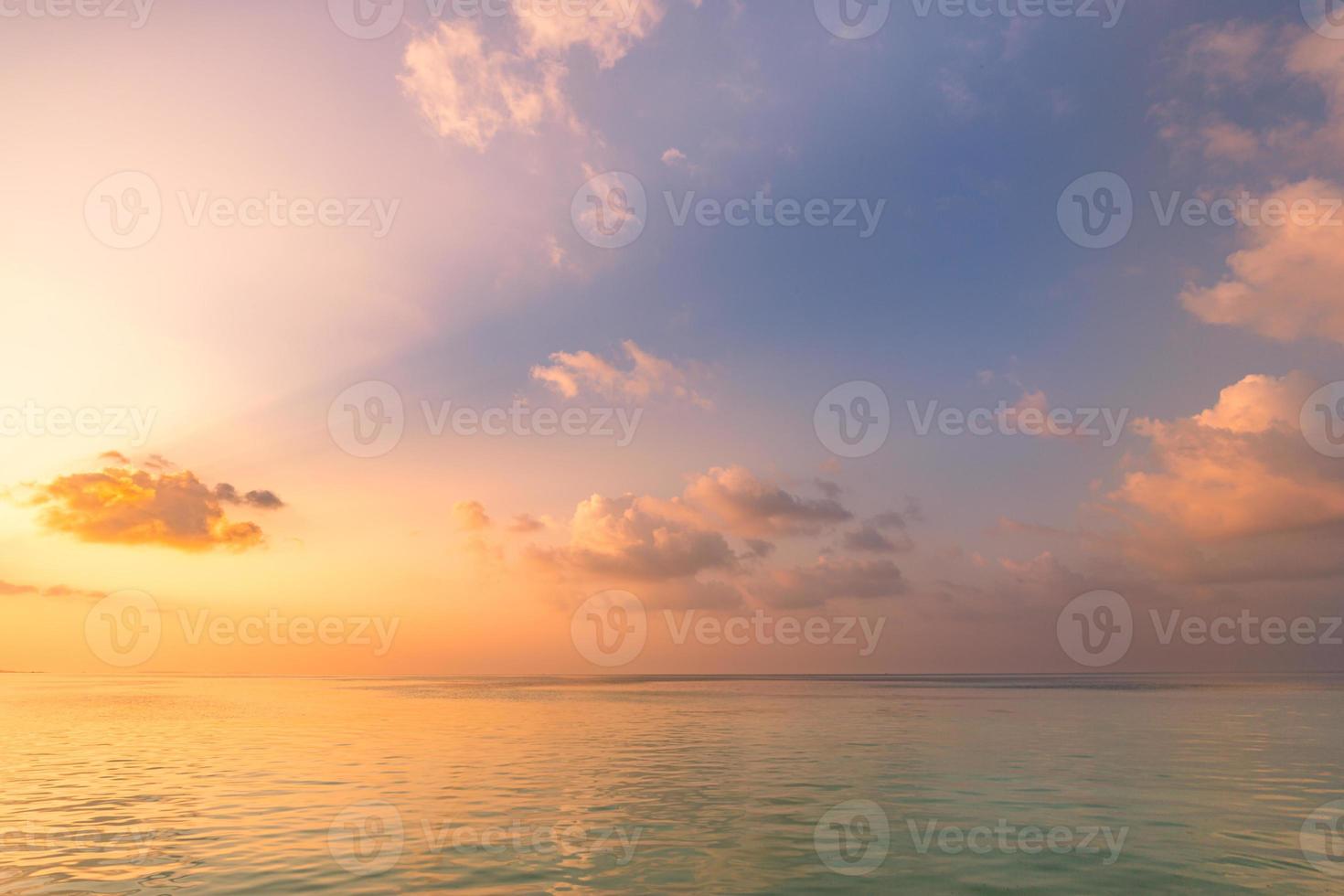 Panoramic beach landscape. Inspire tropical beach seascape horizon. Orange and golden sunset sky calmness tranquil relaxing sunlight summer mood. Vacation travel holiday banner photo