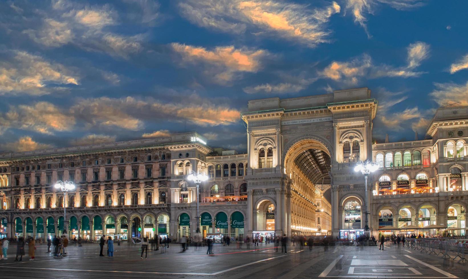 Milan italy 2021 Entrance to the vittorio emanuele gallery in milan where there are luxury shops photo