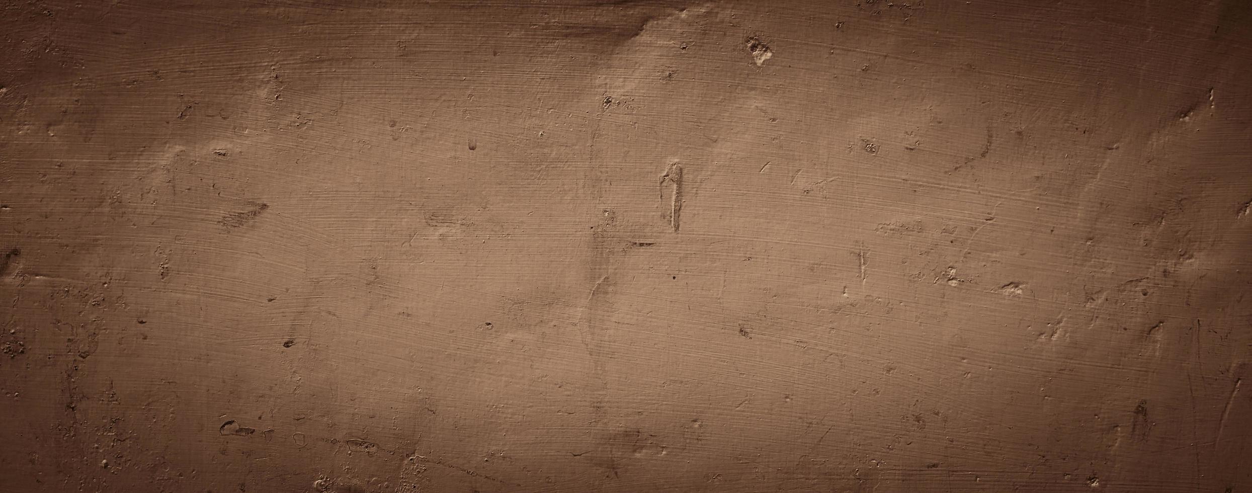 vintage brown abstract texture background of wall concrete photo