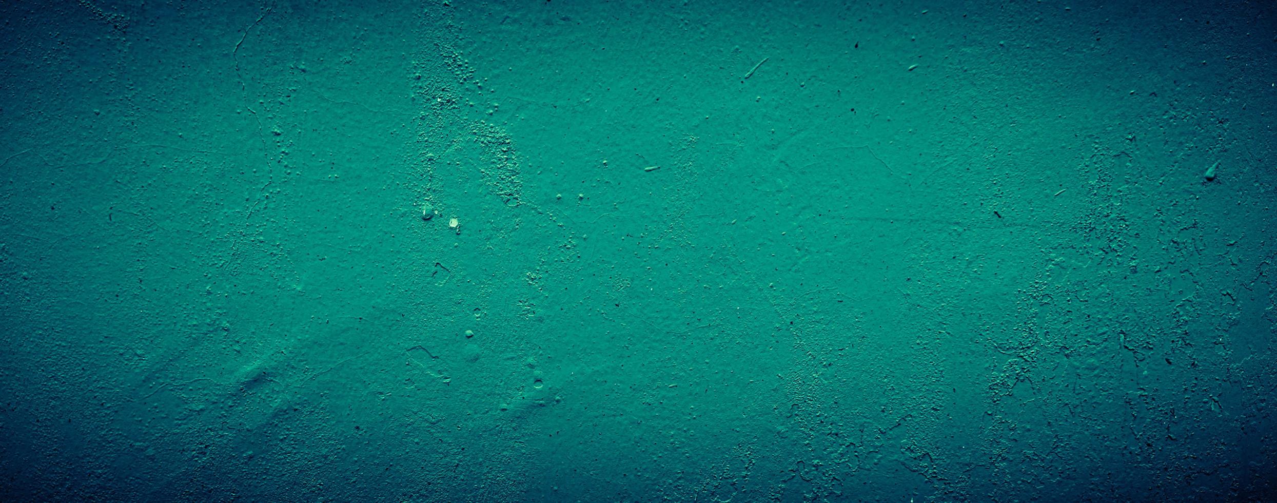 Fondo de textura de pared de hormigón abstracto sucio verde esmeralda oscuro, fondo panorámico foto