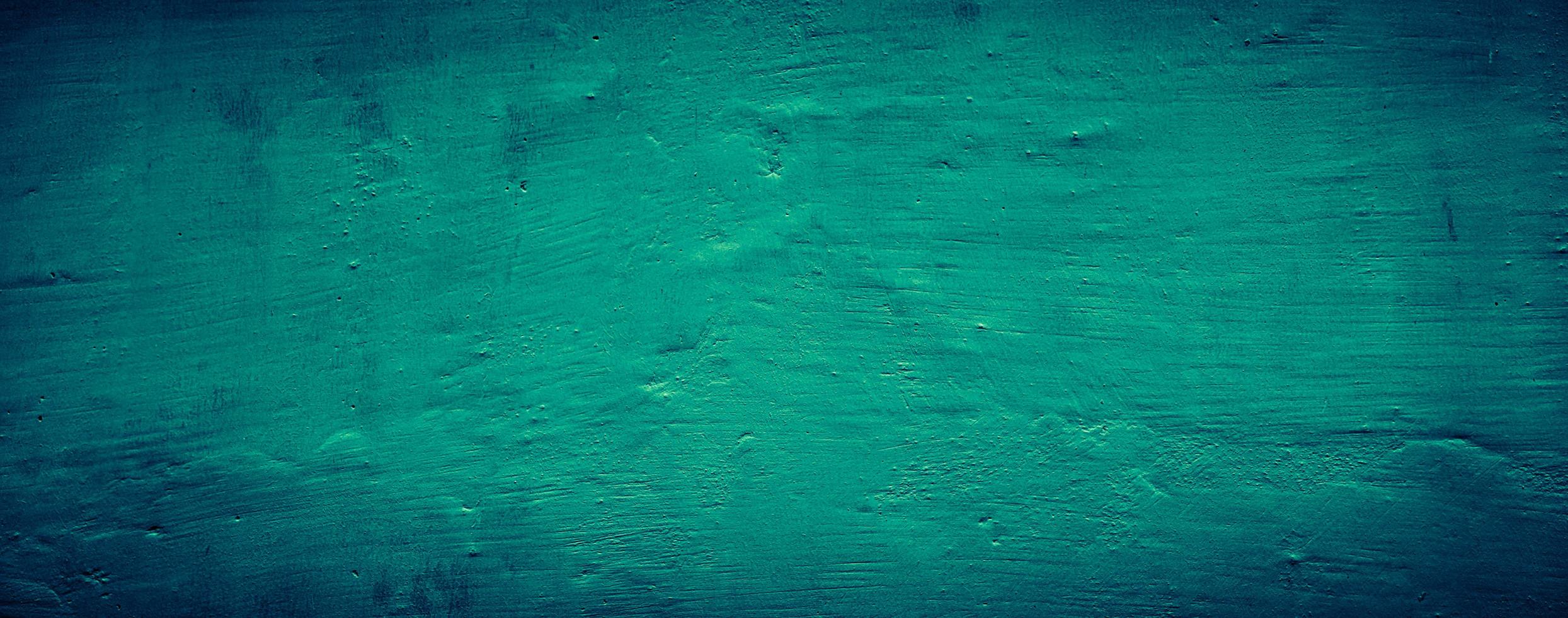 dark emerald green grungy abstract concrete wall texture background, panoramic background photo