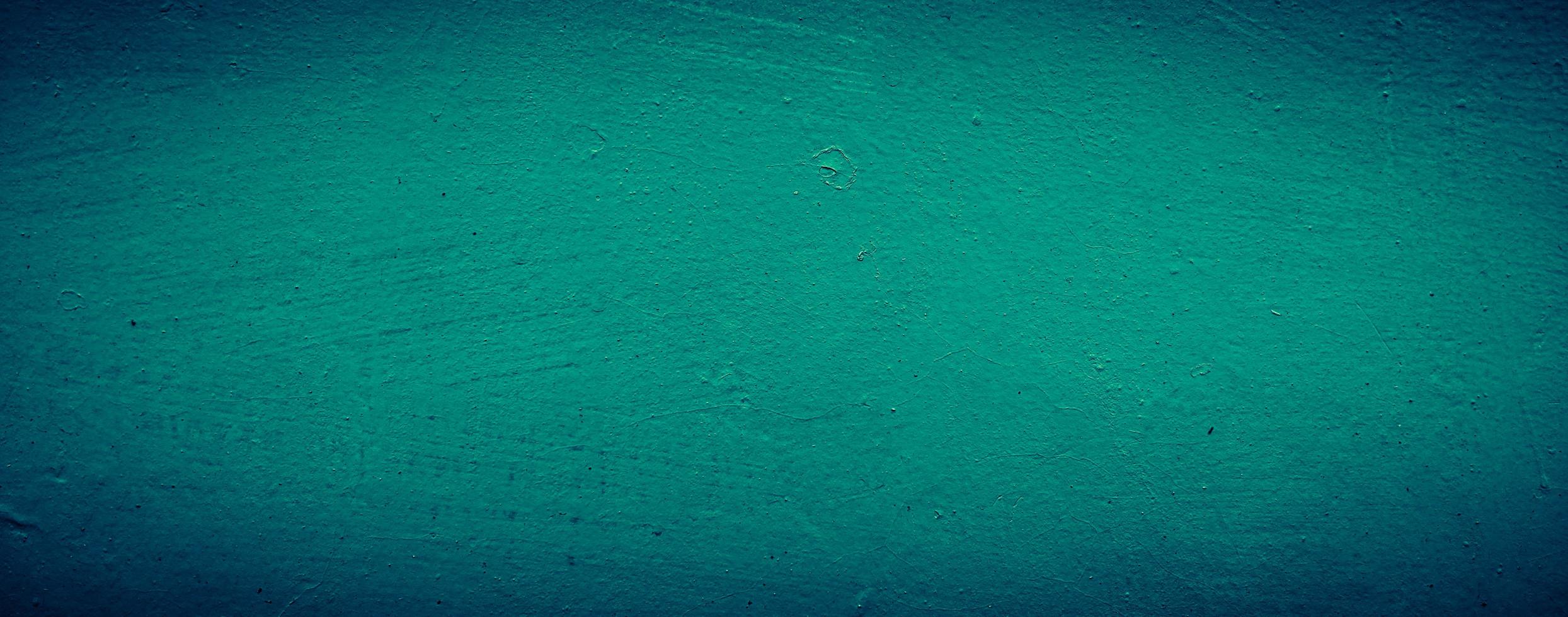 Fondo de textura de pared de hormigón abstracto sucio verde esmeralda oscuro, fondo panorámico foto