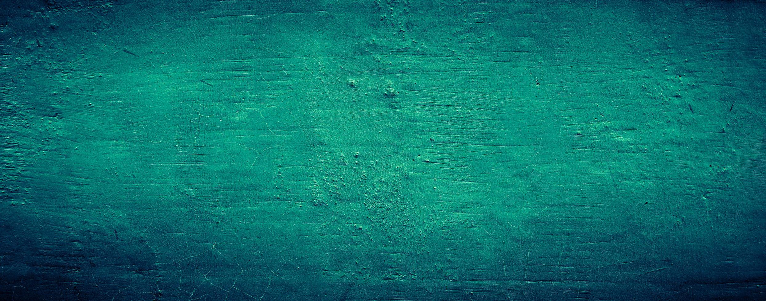 dark emerald green grungy abstract concrete wall texture background, panoramic background photo