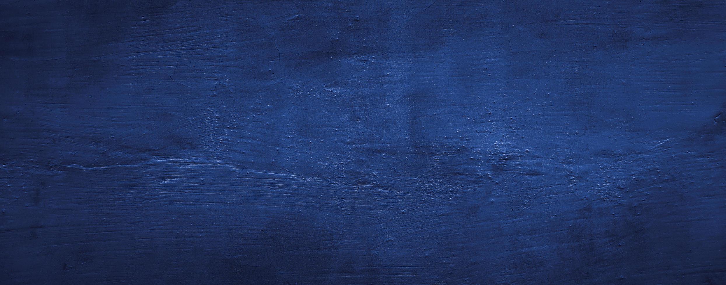 dark blue abstract texture background of wall cement concrete photo