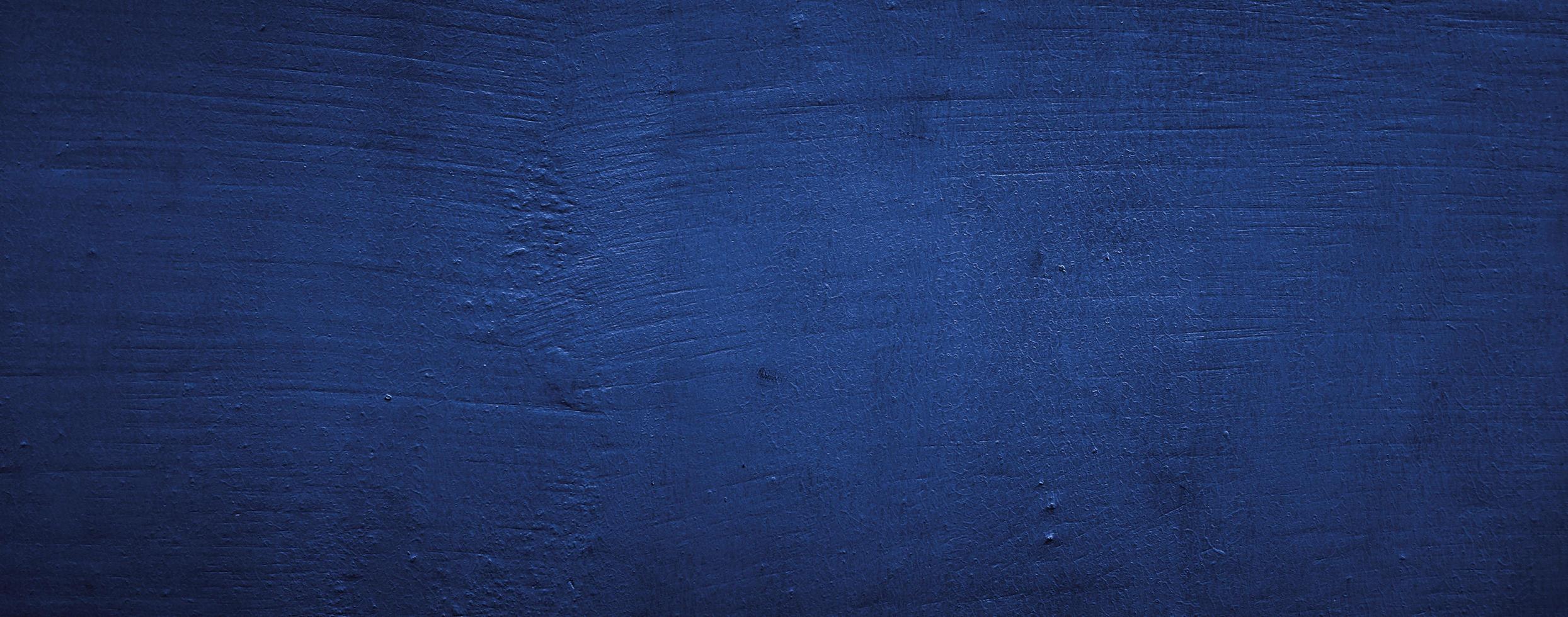dark blue abstract texture background of wall cement concrete photo