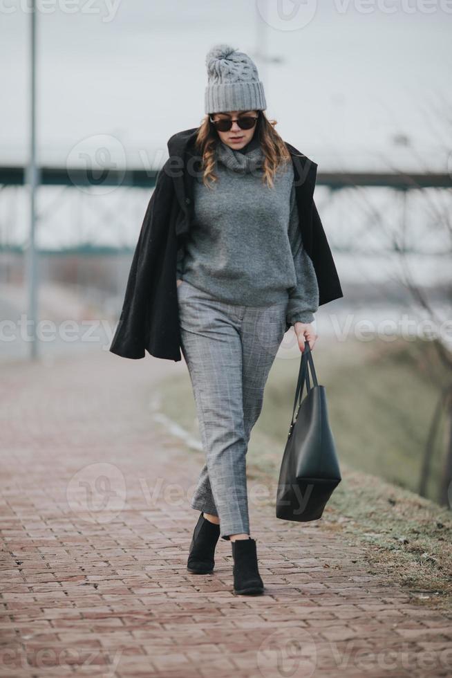 Girl posing outside during cold weather photo