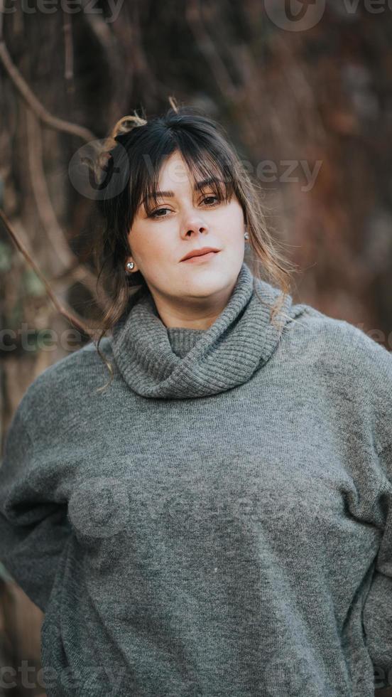 Girl posing outside during cold weather photo