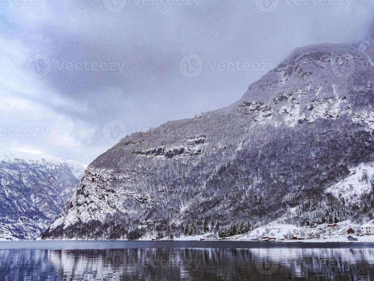 Winter landscape at the fjord lake river in Framfjorden Norway. photo