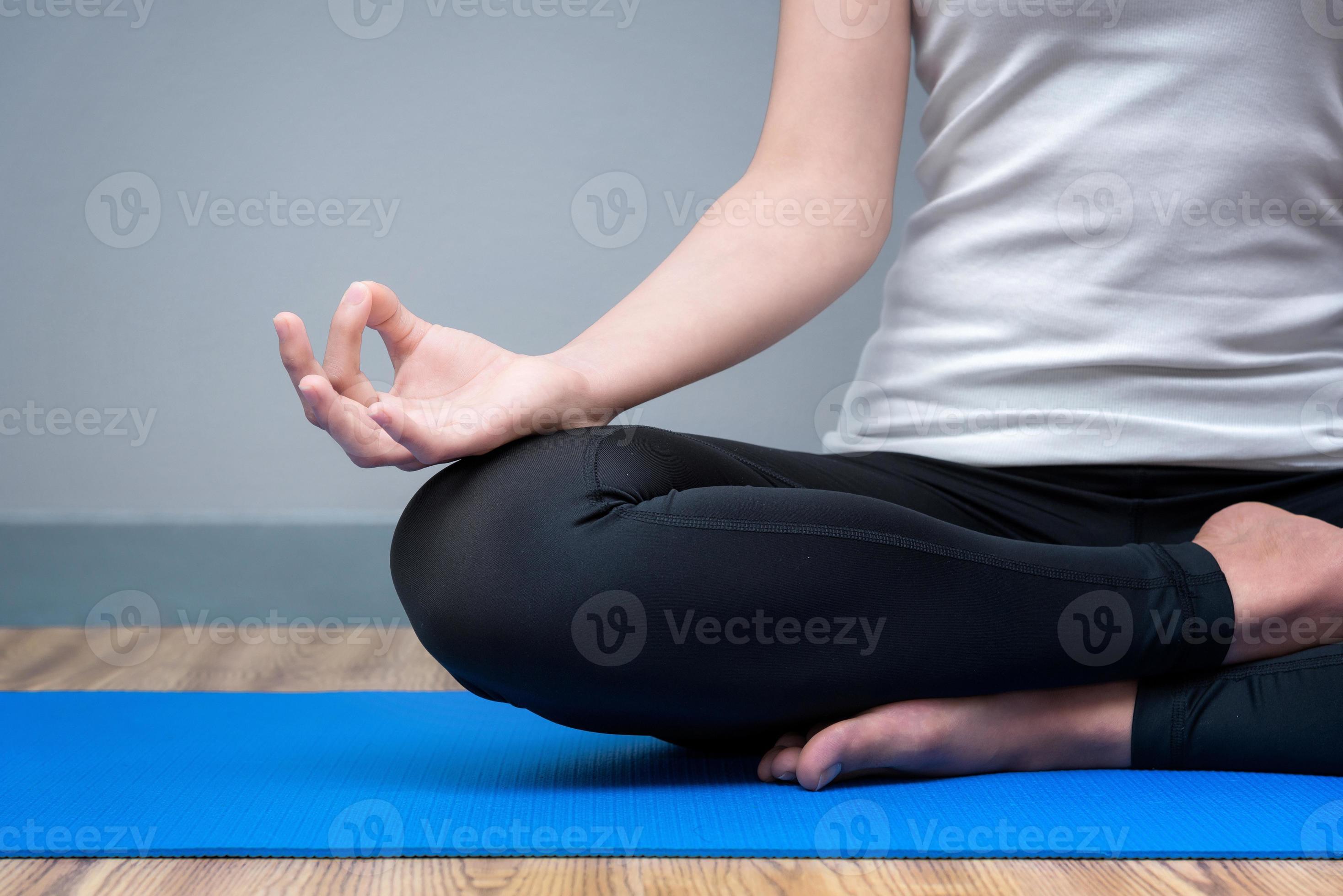 Yoga, welness and wellbeing. Young woman workout, does sport at