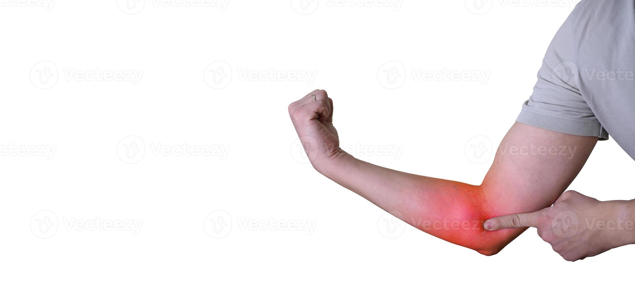 Close-up of a man with elbow inflammation, colored red, suffering from pain and rheumatism. photo