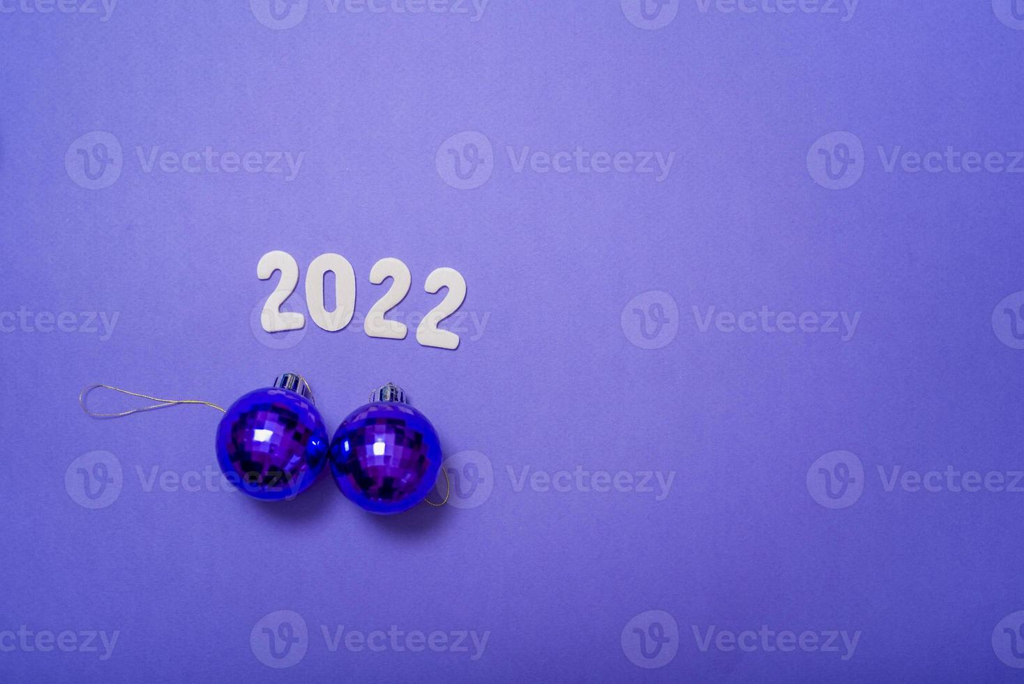 2022 on a lilac background with a view from above. photo