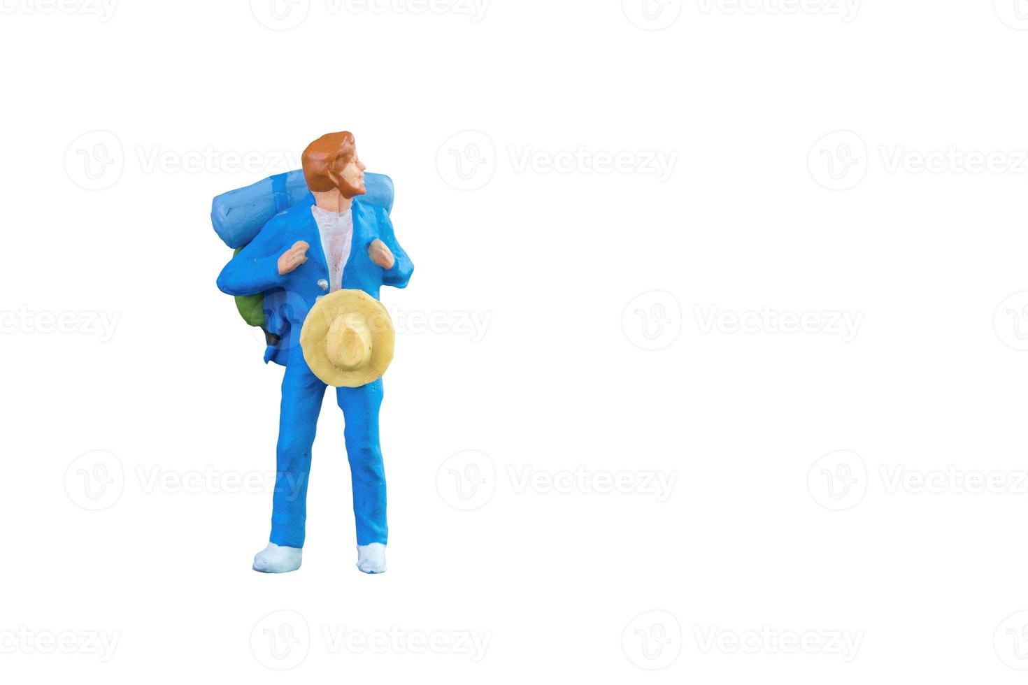 Close up of Miniature backpacker and tourist people isolated with clipping paht on white background.Elegant Design with copy space for placement your text, mock up for travel concept photo