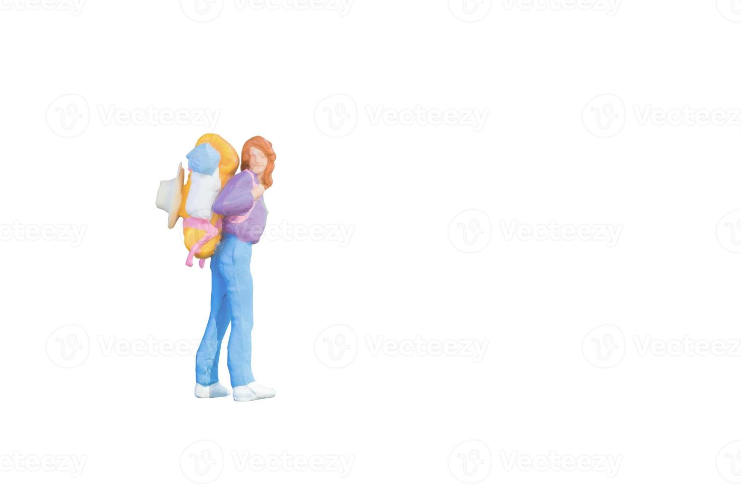 Close up of Miniature backpacker and tourist people isolated with clipping path on white background.Elegant Design with copy space for placement your text, mock up for business and travel concept photo