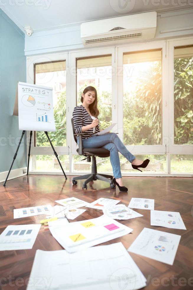 Asian entrepreneur thinking for business strategy concept at home office.Conceptual for startup small businesses entrepreneur and freelance. photo