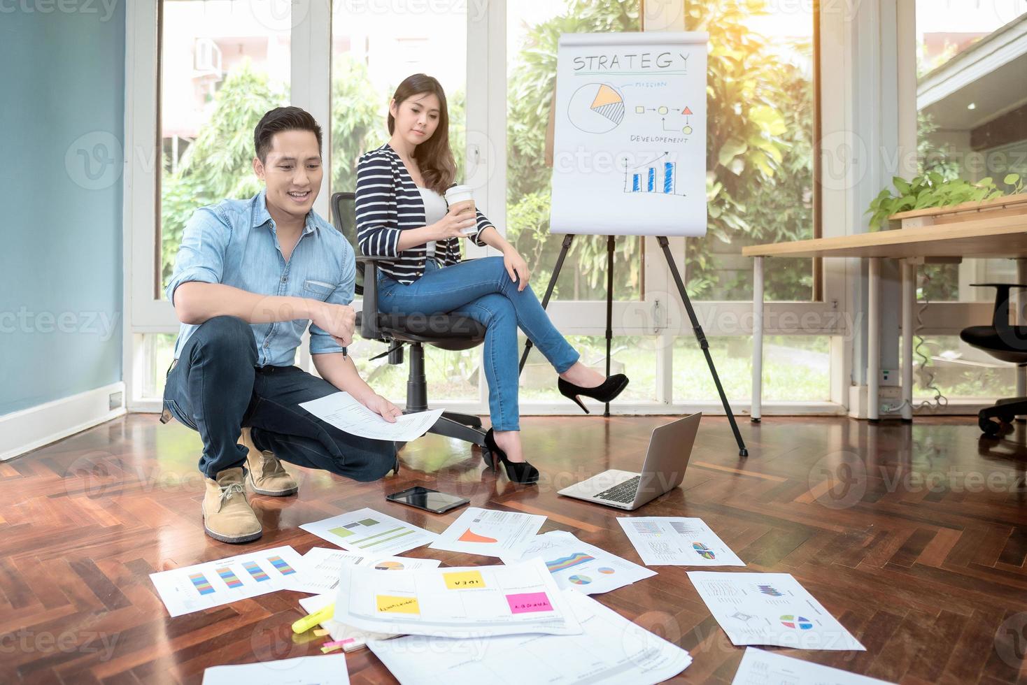 Asian entrepreneur meeting to brainstorm and discussion for business strategy concept at home office.Conceptual for startup small businesses entrepreneur and freelance. photo