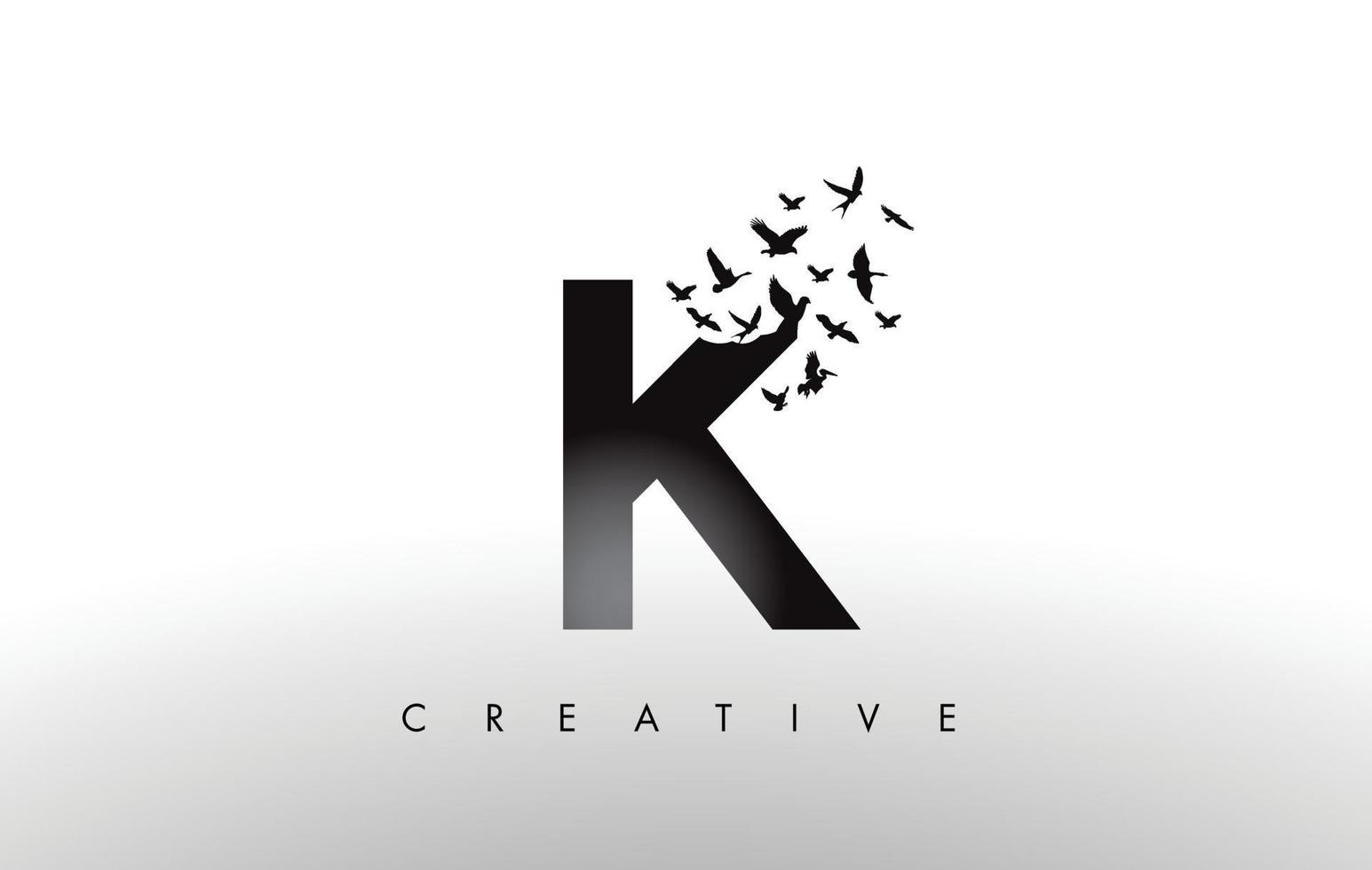 Letra del logotipo k con bandada de pájaros volando y desintegrando de la letra. vector