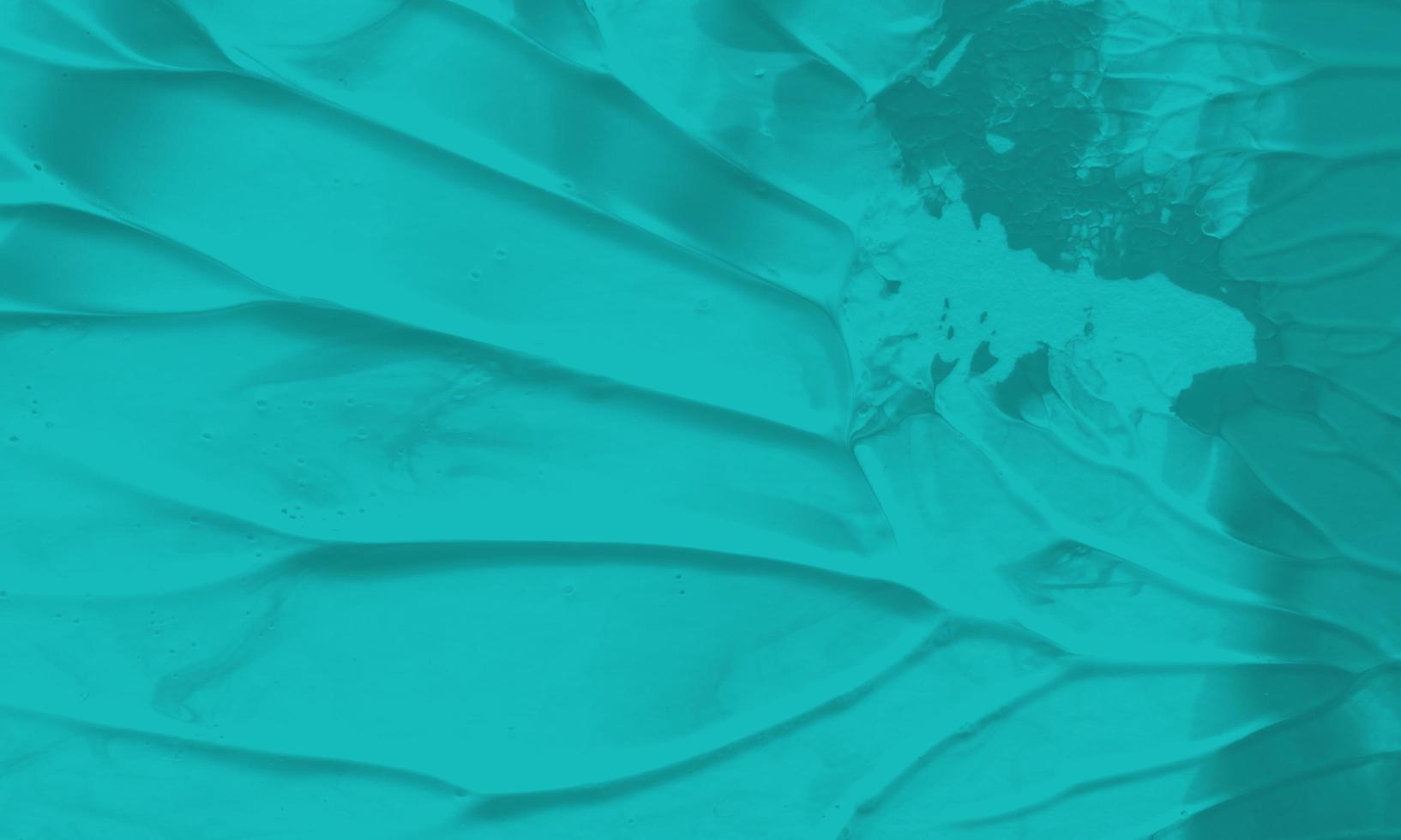 An abstract acrylic painting background with blue green color photo