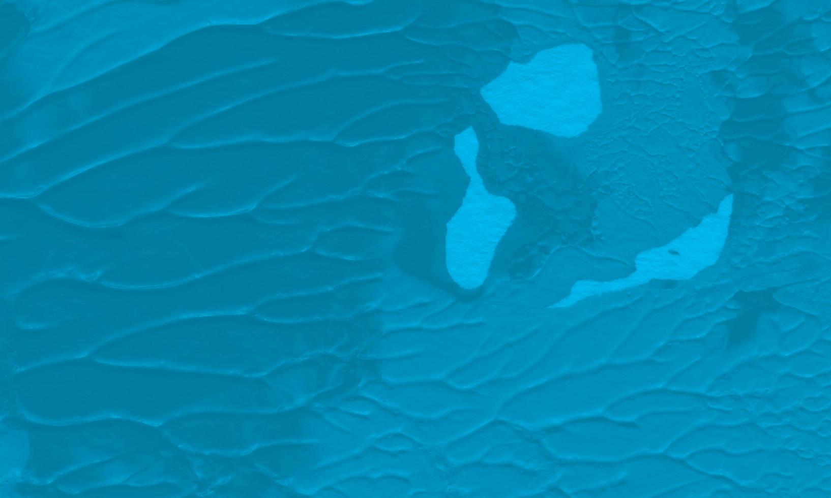 An abstract acrylic painting background with process blue color photo