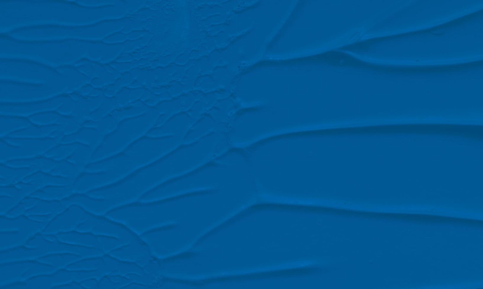 An abstract acrylic painting background with royal blue color photo