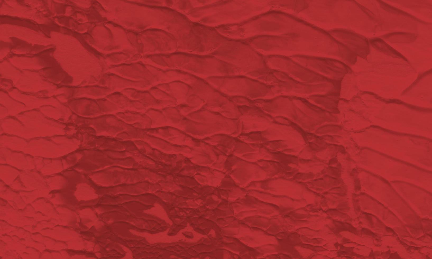 An abstract acrylic painting background with maroon color photo