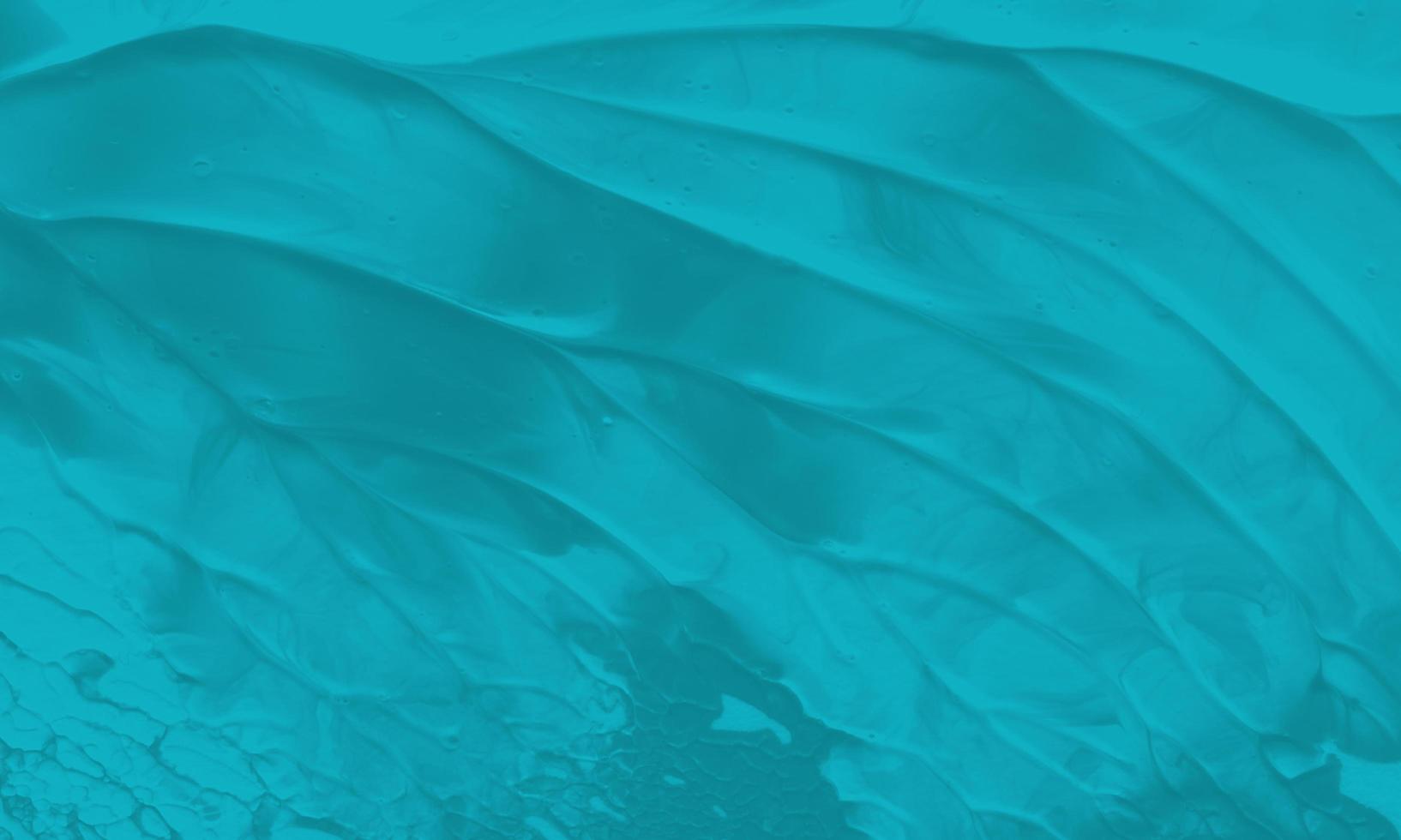 An abstract acrylic painting background with turquoise color photo