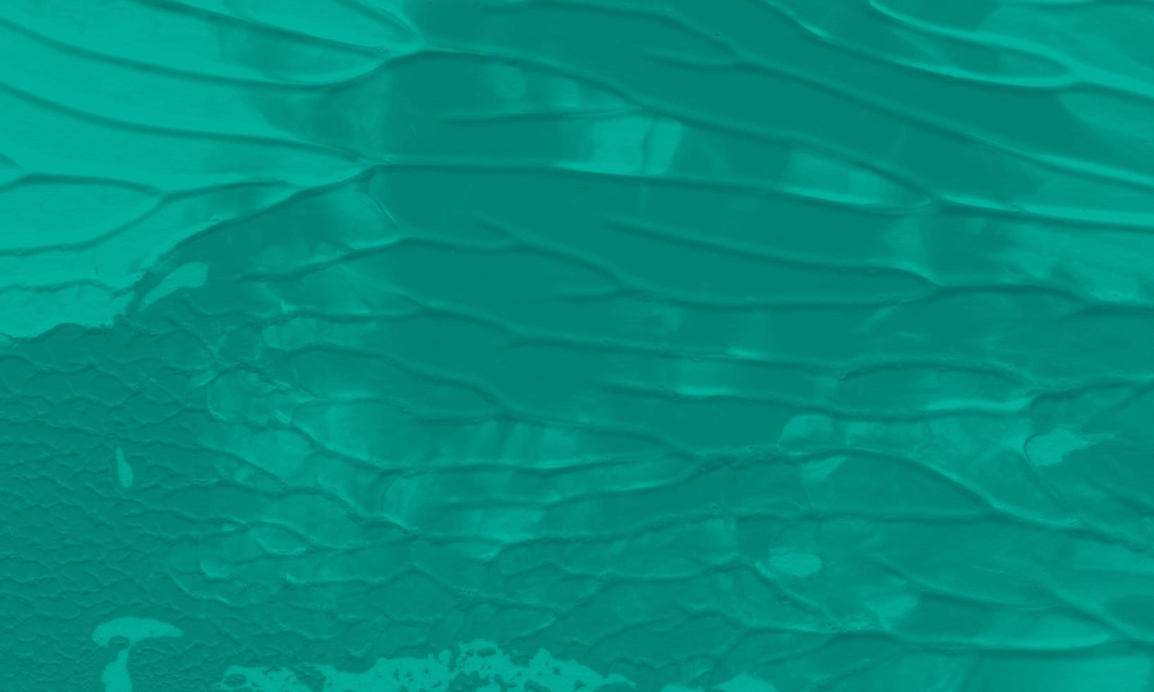 An abstract acrylic painting background with jungle green color photo