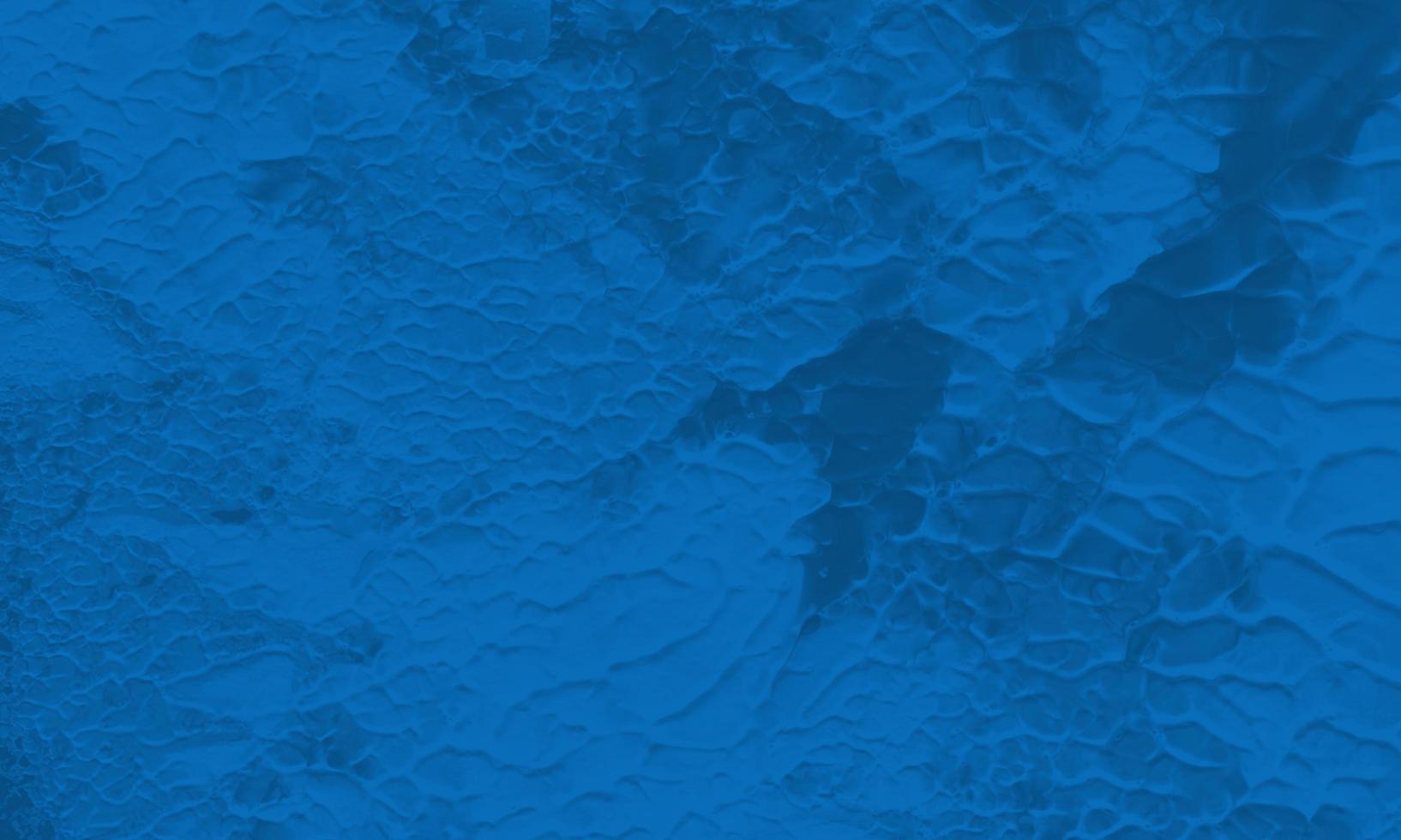 An abstract acrylic painting background with navy blue color photo