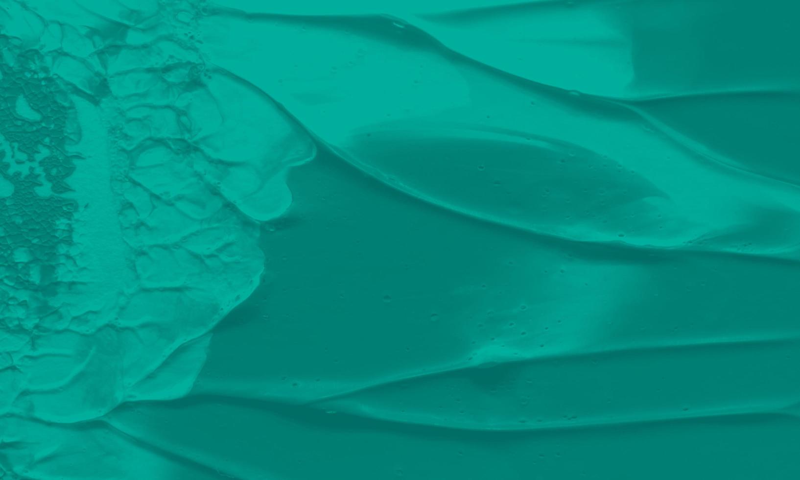An abstract acrylic painting background with emerald color photo