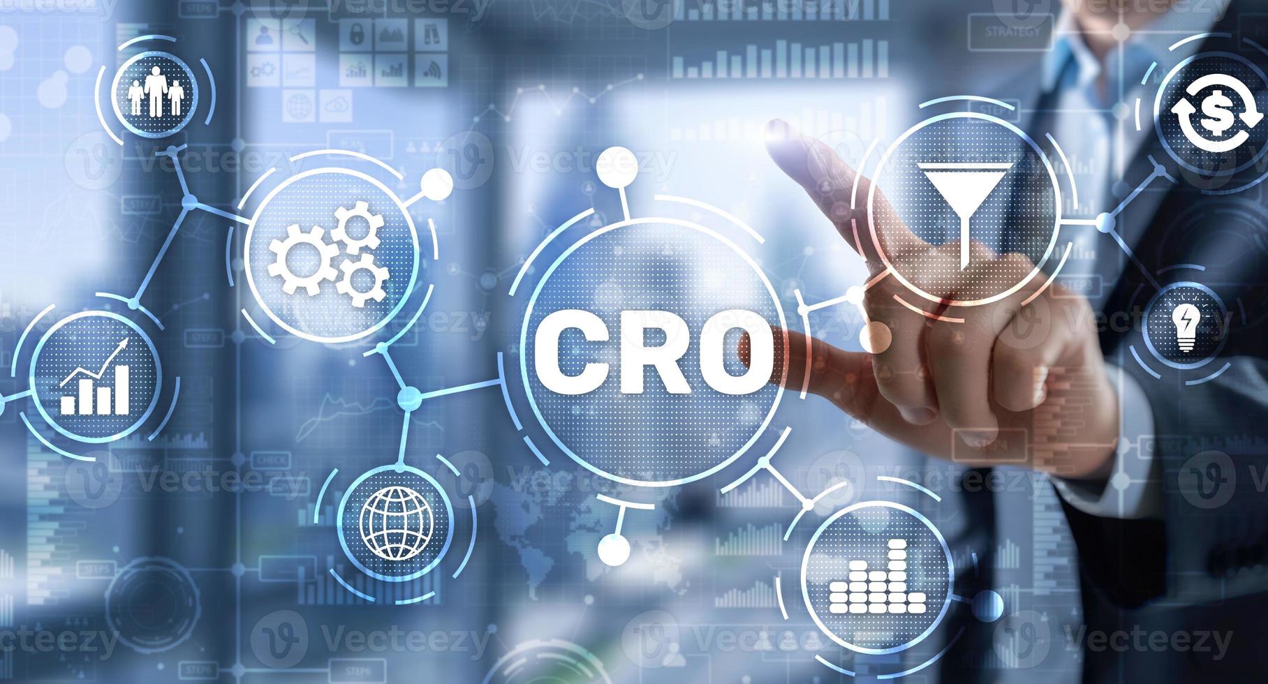 Conversion Rate Optimization. CRO Technology Finance concept Businessman pressing on a virtual screen photo