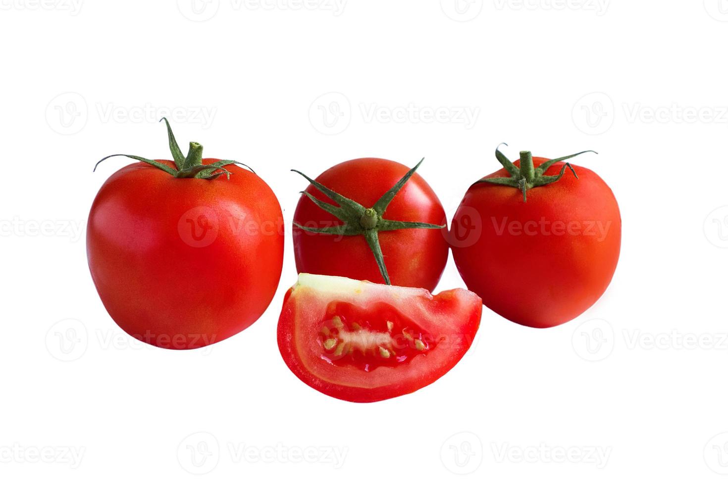 three red tomatoes and a slice, isolate photo