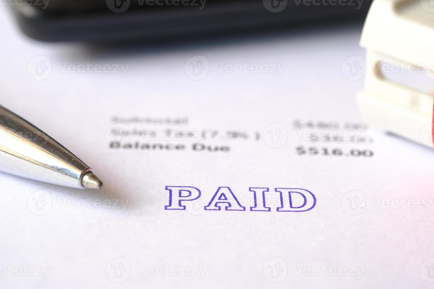 Paid invoice and Rubber Stamp on paper , 4889277 Stock Photo at Vecteezy