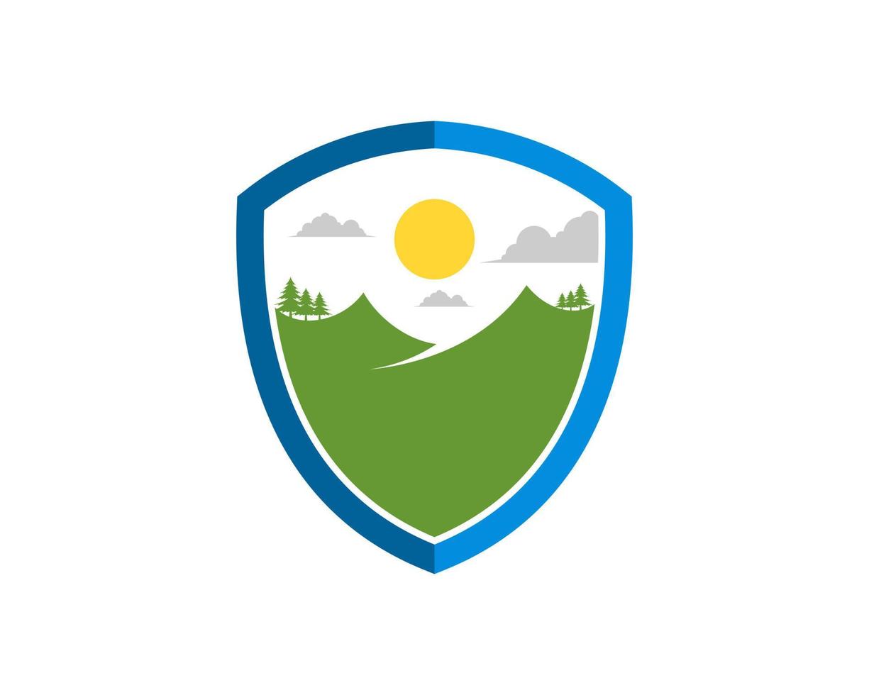 Simple shield with beautiful mountain inside vector