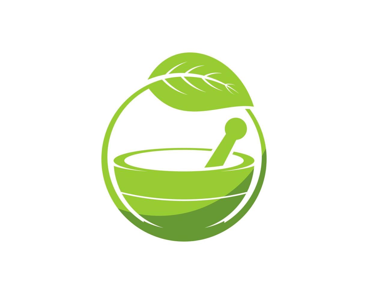 mortal and pestle inside the circle leaf vector