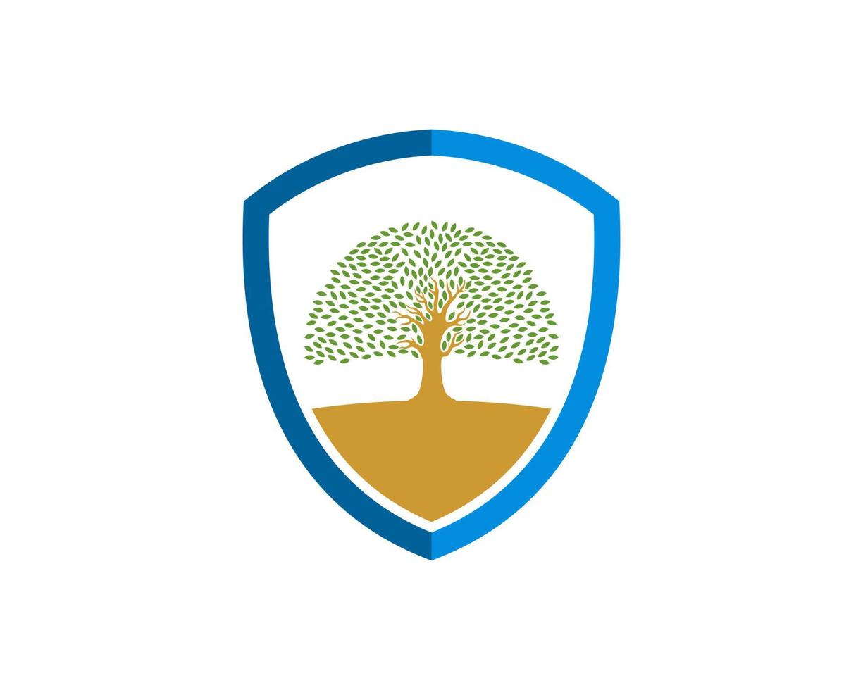 Protection shield with oak tree on the land inside vector