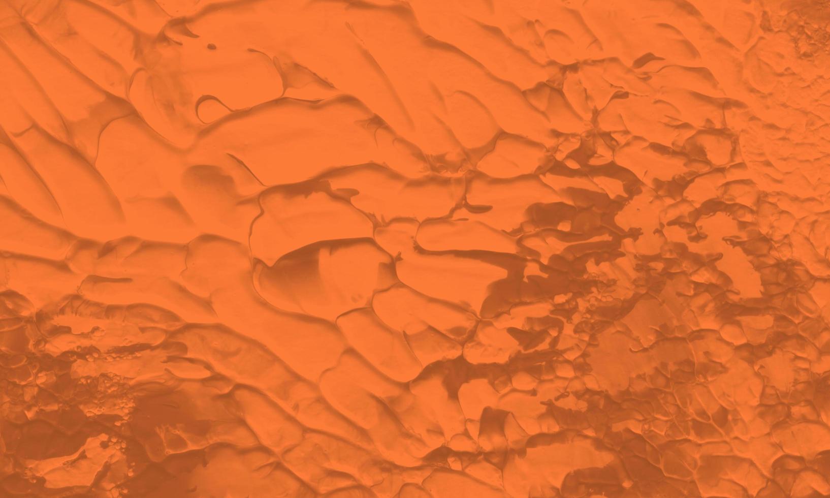 An abstract acrylic painting background with orange color photo