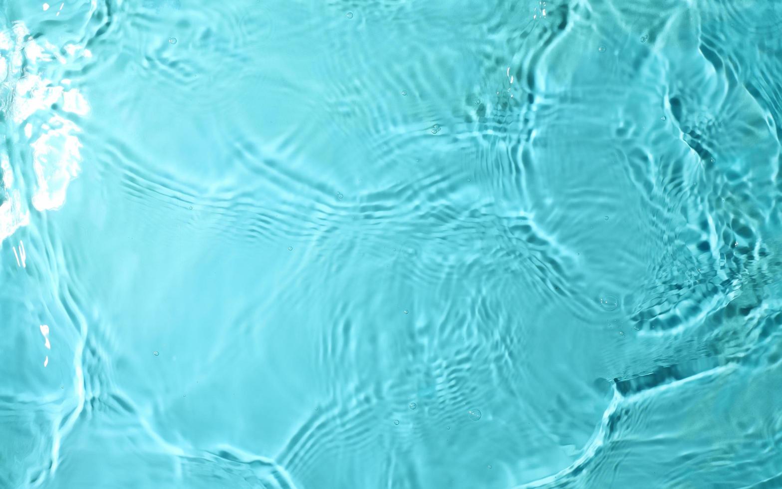 texture of splashing water on pastel background photo