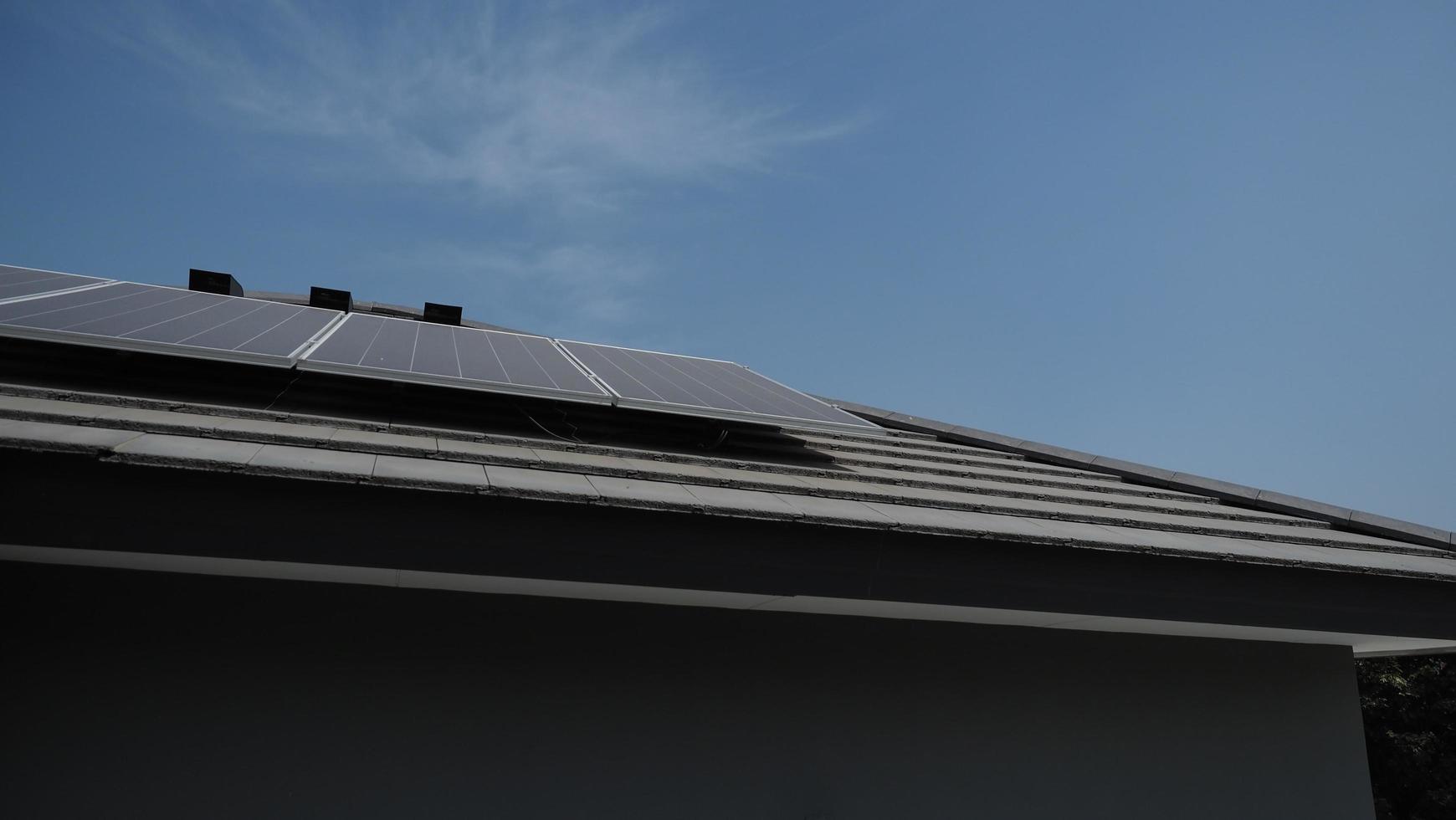 Photovoltaic. Solarcell panel. Solar roof power plant on the roof photo