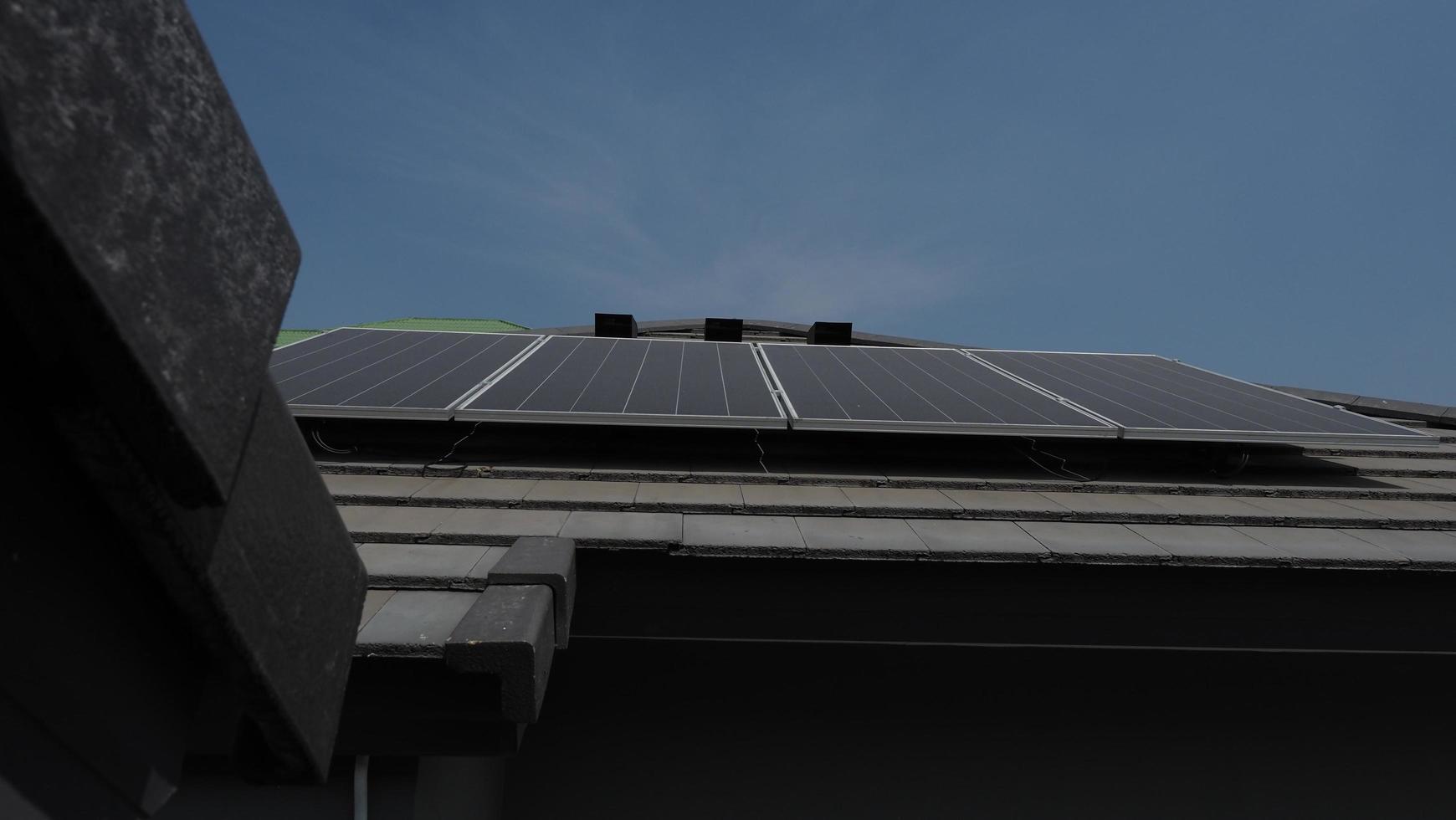 Photovoltaic. Solarcell panel. Solar roof power plant on the roof photo