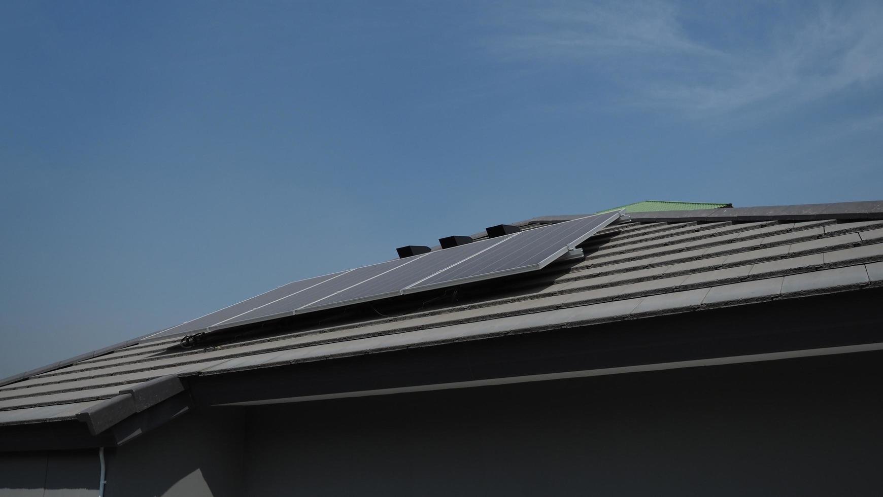 Photovoltaic. Solarcell panel. Solar roof power plant on the roof photo