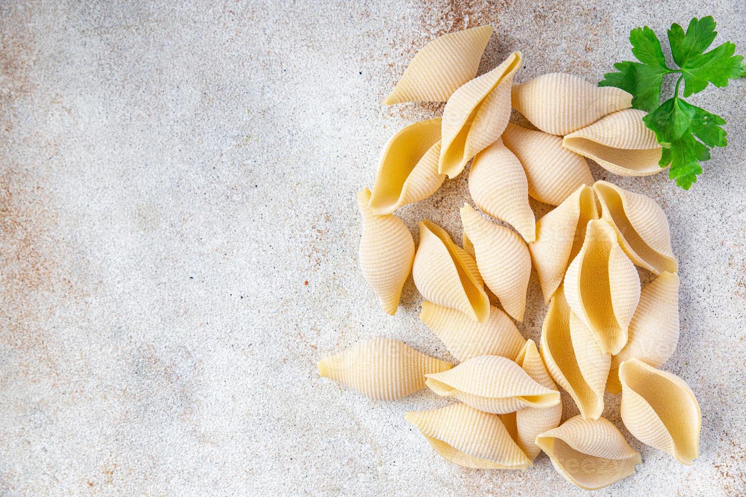 pasta conchiglie raw shell healthy meal food background photo