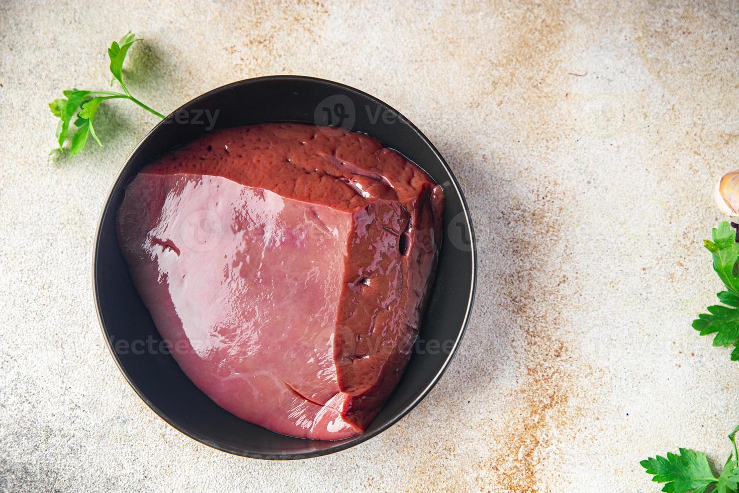 pork liver offal fresh piece of pork meat keto or paleo diet photo