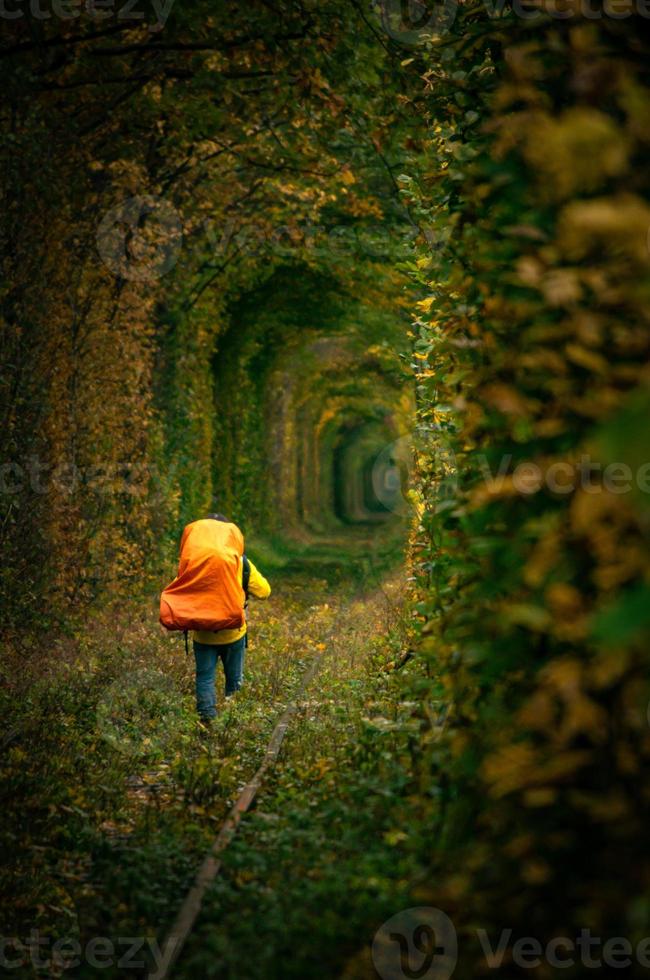 person walk on railway photo