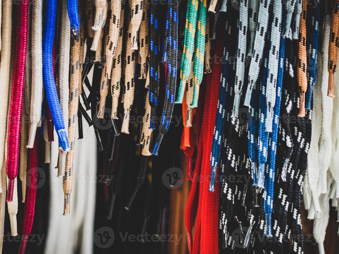 Various new shoe laces on display photo