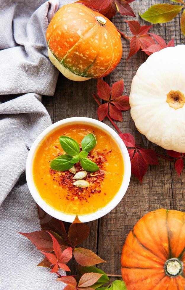 Bowl of pumpkin soup photo