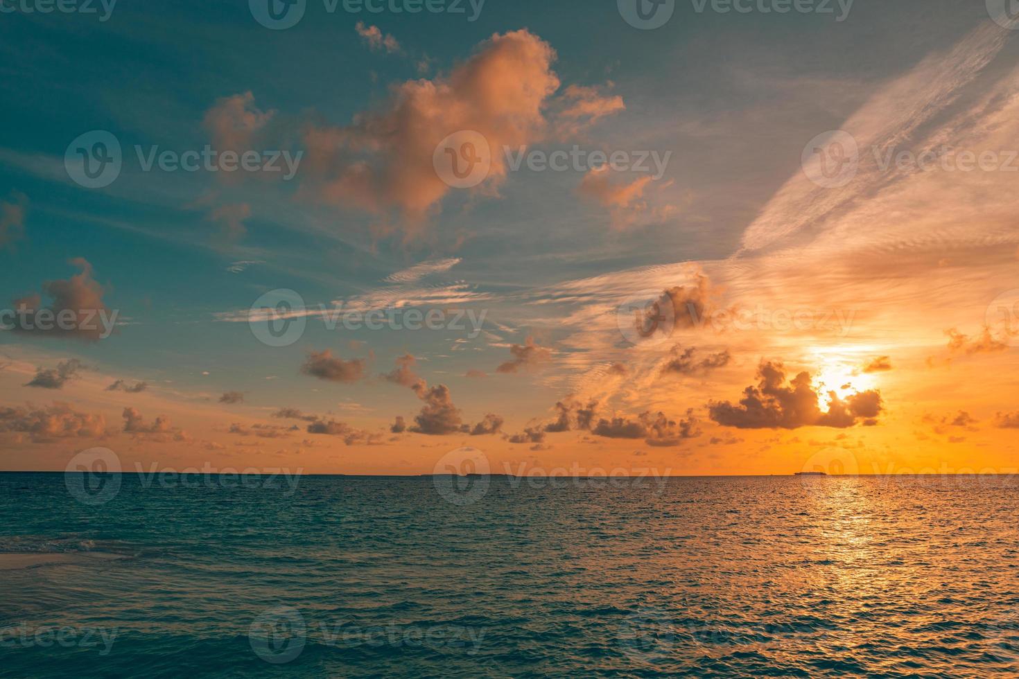 Ocean and clouds it is low over water in the afternoon. Beautiful seascape. Sea waves beach. shore, coast photo