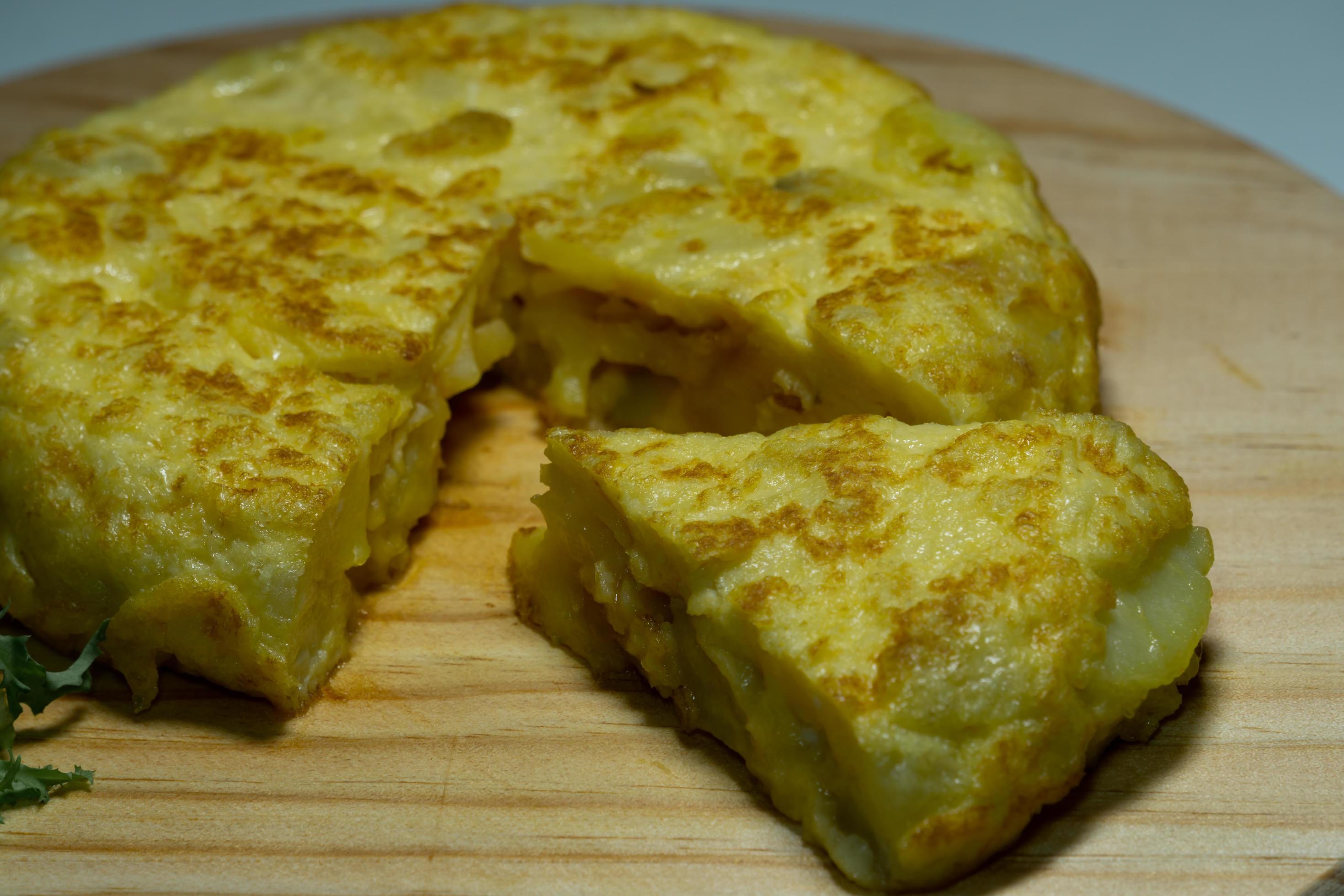 typical spanish potato omelette 4899378 Stock Photo at Vecteezy