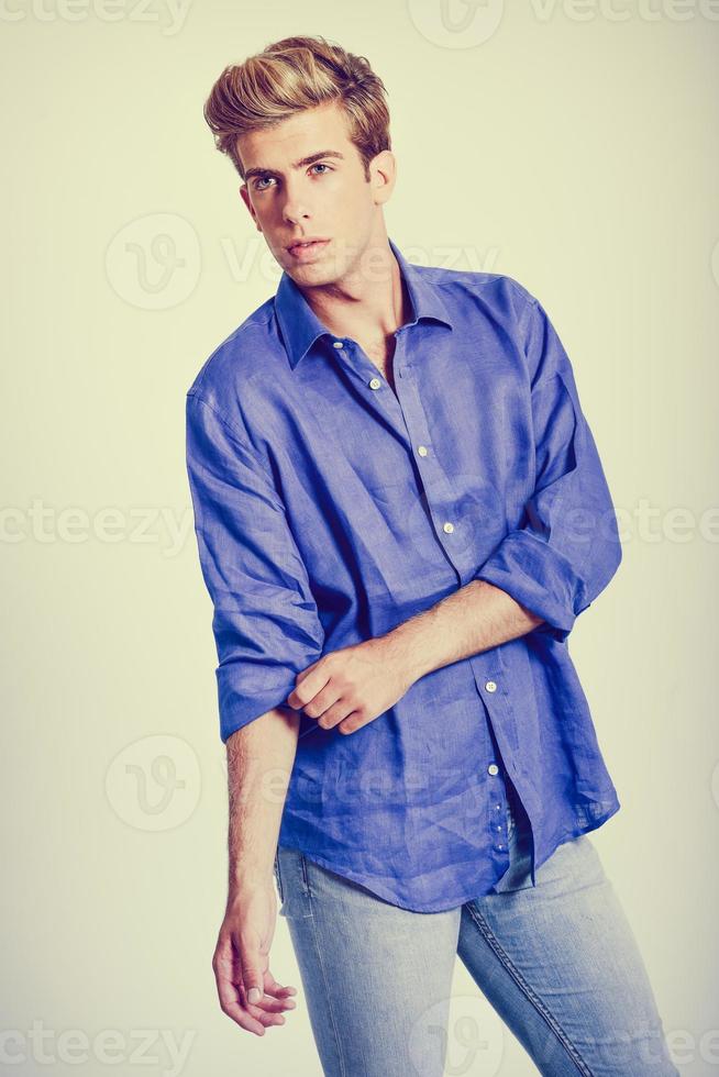 Handsome blonde man wearing shirt photo