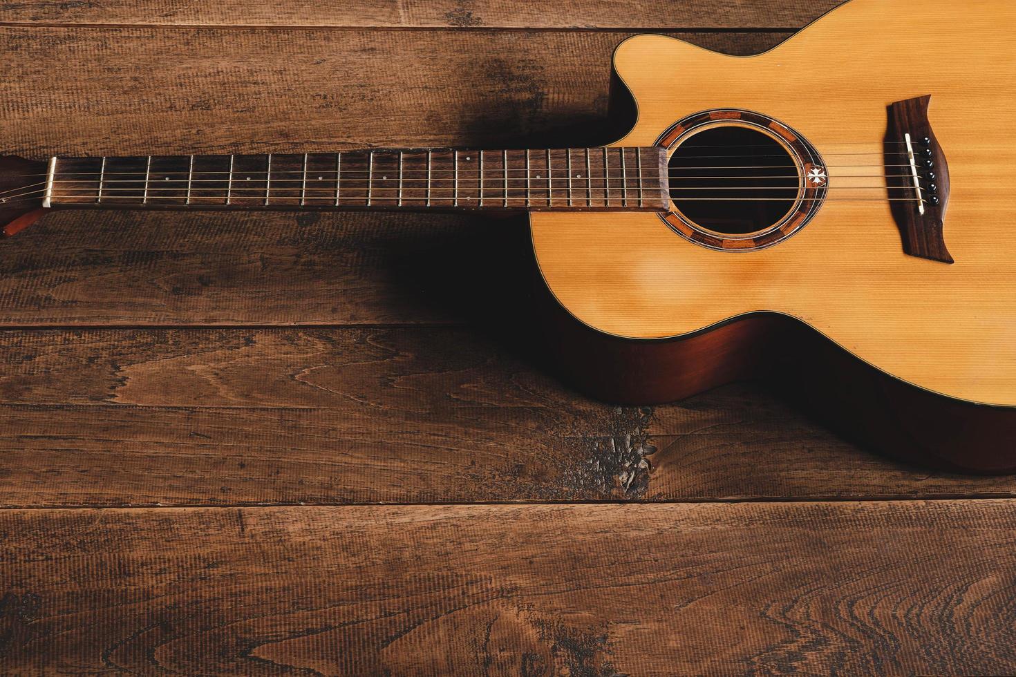 classical guitar on wooden background photo