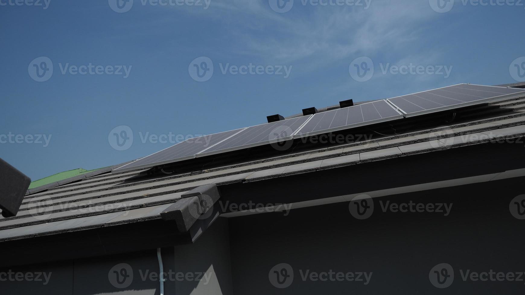Photovoltaic. Solarcell panel. Solar roof power plant on the roof photo