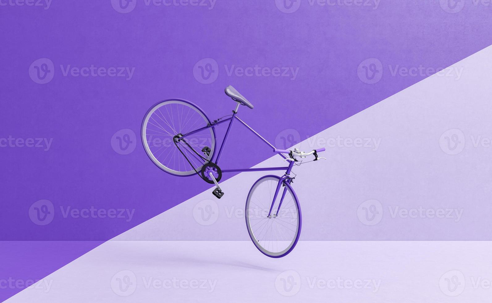 Bicicleta retro volando con pared dividida en dos colores. foto